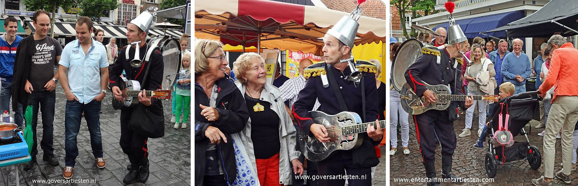 Met gitaar, mondtoeter, rinkelende bellen en rugpercusie speelt de straatmuzikant op pleinen en straten, Muziek, muzikanten, bandje, straatmuziek, muziek op de markt, feestmuziek, evenement organiseren, festival artiesten, beurs en promotie acts, entertainment, animatie acts, animatieact, Straattheater, straatartiesten, artiesten boeken, artiestenbureau, artiestenburo, themafeest, Govers Evenementen, www.goversartiesten.nl