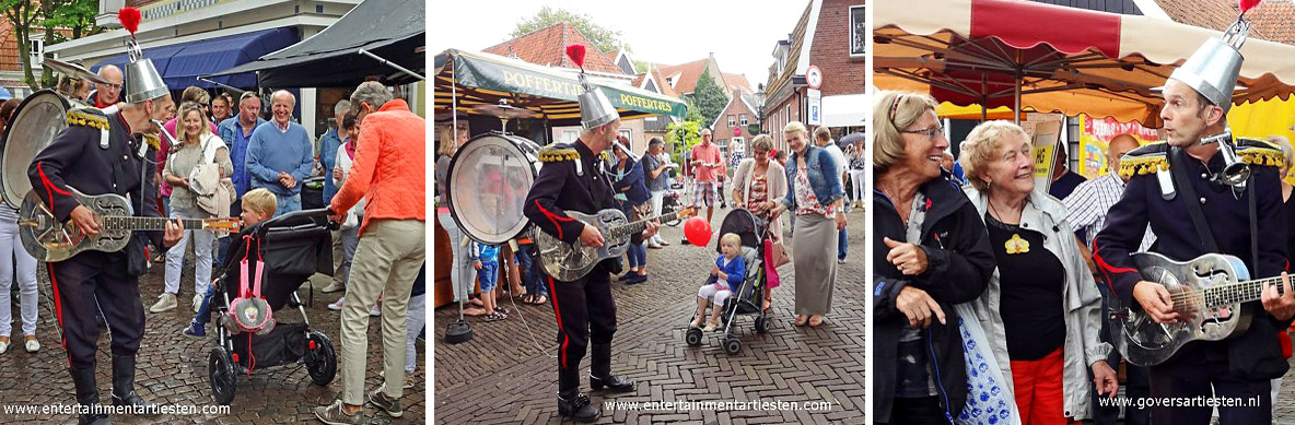 Winkelcentrum promotie activiteiten, Met gitaar, mondtoeter, rinkelende bellen en rugpercusie speelt de straatmuzikant Blikken Rik op pleinen en straten, Govers Evenementen, www.goversartiesten.nl