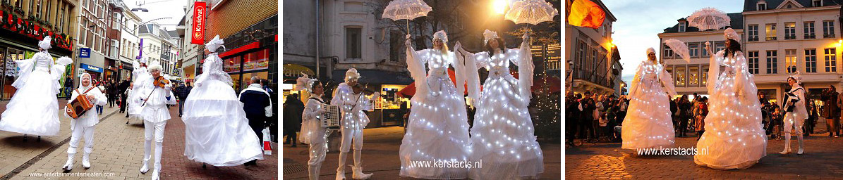 De Witte IJskoninginnen en muzikanten zijn een vrolijk muzikaal tafereel op stelten die met hun verlichte hoepelrokken een sprookjes tonen. Steltenloper Steltentheater, Govers Evenementen, www.goversartiesten.nl