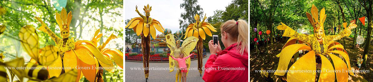 Steltenact steltenlopers act zonnebloemen op stelten is een oogverblindende verschijning: Steltenloper - Steltentheater Govers Evenementen, www.goversartiesten.nl